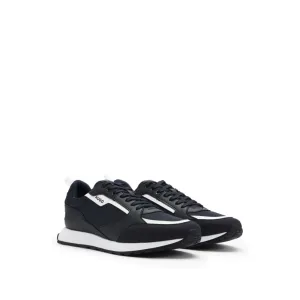 Mixed-material trainers with branded accents